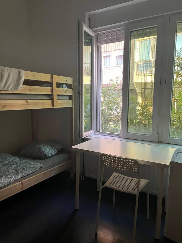Single Bed in Dormitory Room image 1