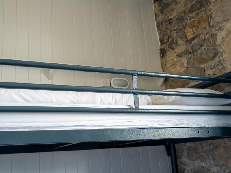 Bunk Bed in Male Dormitory Room with Shared Bathroom image 1