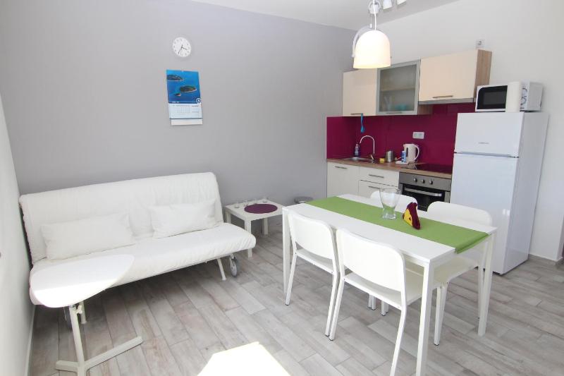 One-Bedroom Apartment with Terrace and Sea View image 3