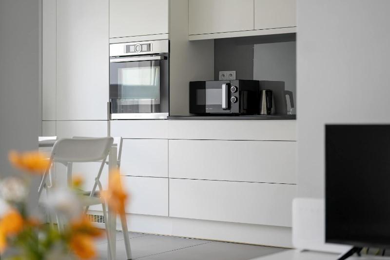 Stylish Apartment for 4 People with Parking in Poznań by Noclegi Renters - image 17
