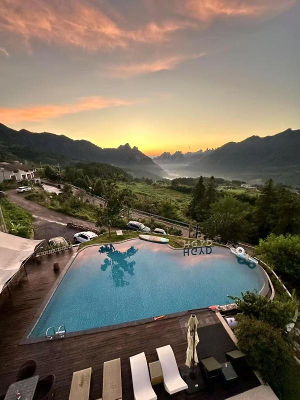 Zhangjiajie Flowers ValleyWatching Sunrise Cloud Sea enjoying an infinity pool free Chinese and Western breakfast and free shuttle service to the entrance of the National Forest Park - image 37
