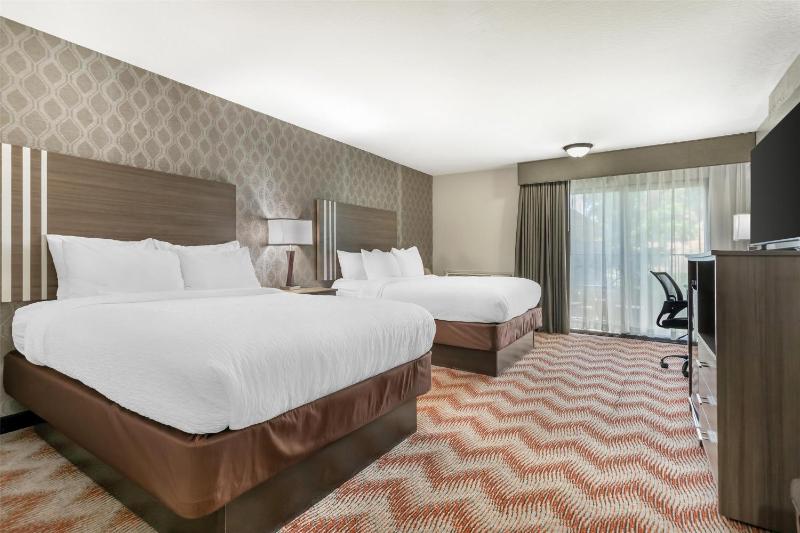 Queen Suite with Two Queen Beds and Sofa Bed