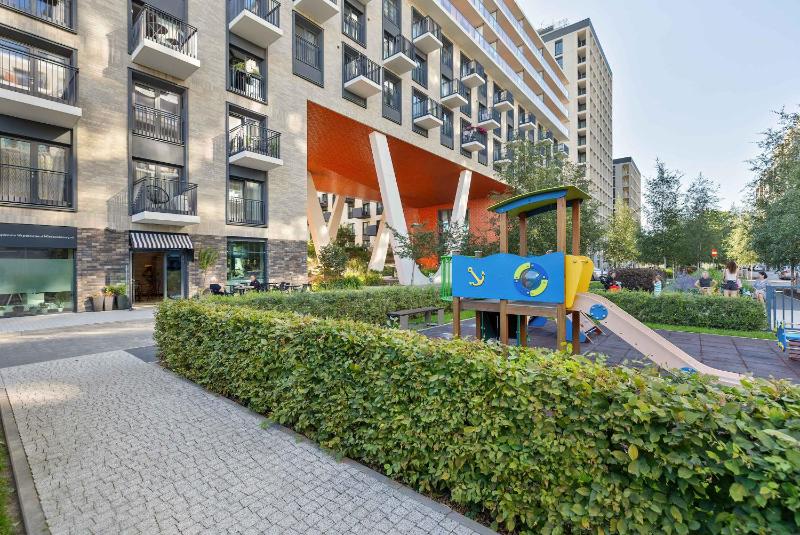Modern Apartment with AC & Parking in Wrocław by Noclegi Renters - image 19
