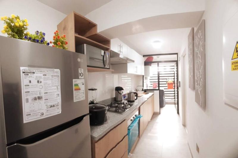 Bello departamento con cochera y excelente ubicación - image 14