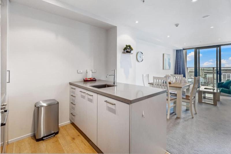 CBD 2BR Retreat w Pool & Gym by Zodiak Stays - image 14