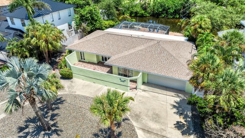 Palm Island Life - Heated Pool Canal Front Fire Pit Walk to Siesta Beach - image 16