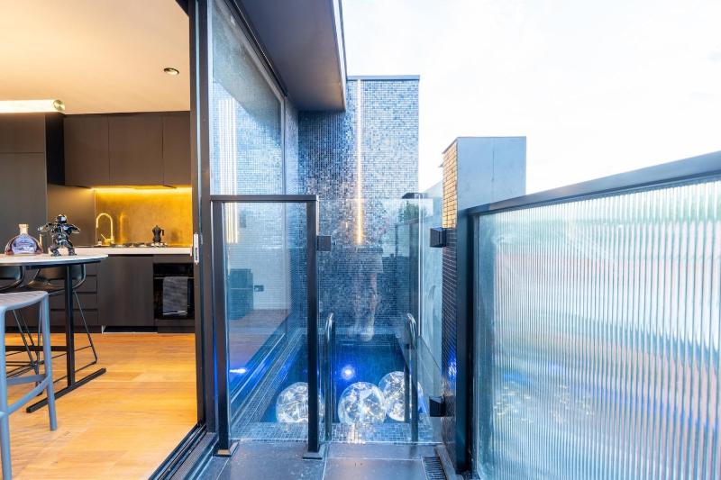 The Floating Glass Pool Retreat - image 8