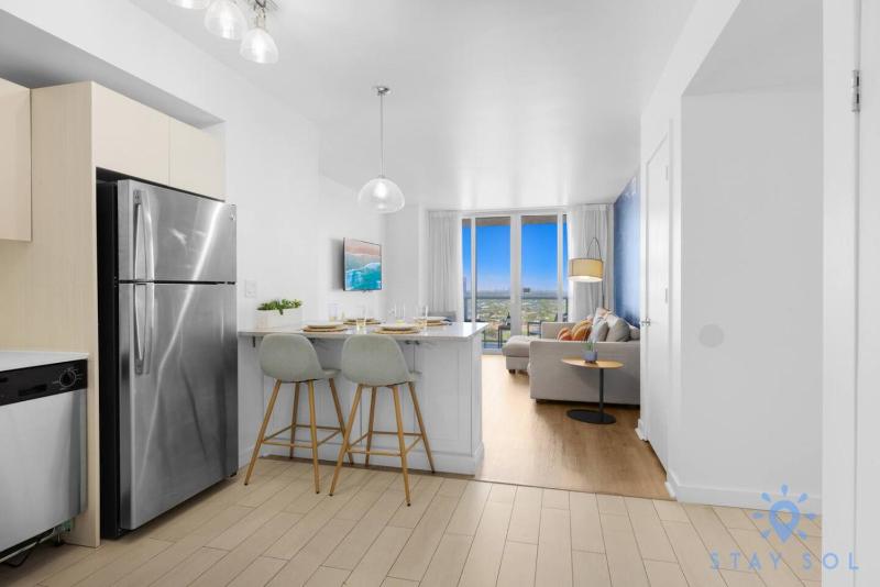 Stylish 2BR High-Rise Retreat w Ocean Views - image 36