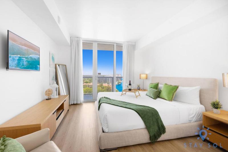 Stylish 2BR High-Rise Retreat w Ocean Views - image 14
