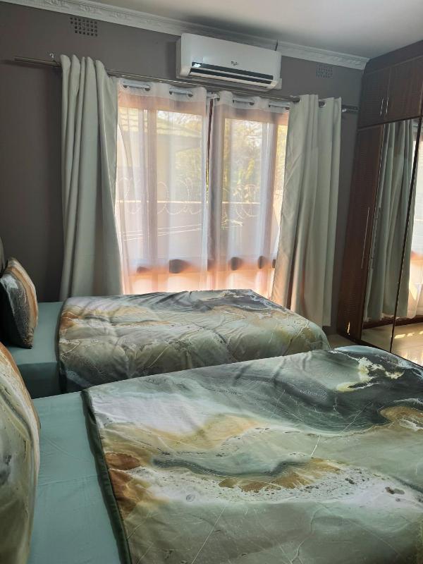 Niza Homes Pool No Blackouts & Walk to Munali Mall - image 8