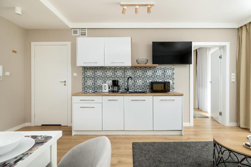 Pobierowo Baltic Residence Apartment with Pool & Balcony by Noclegi Renters - image 9