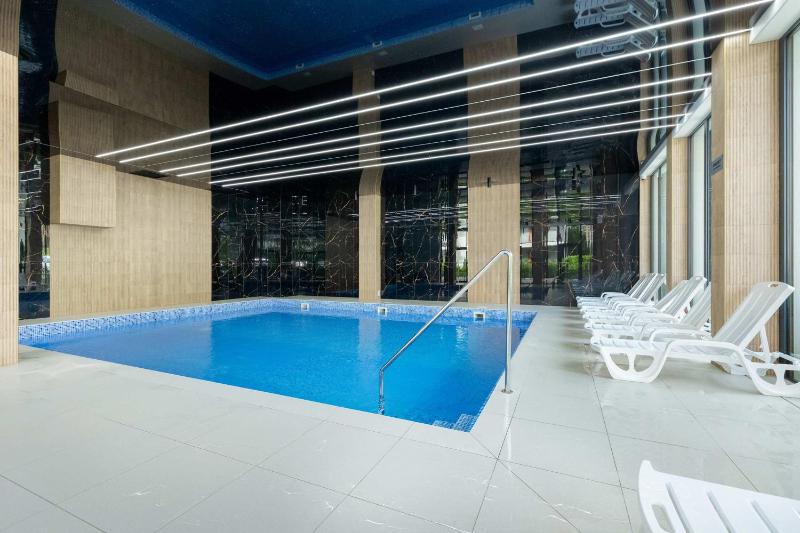Pobierowo Baltic Residence Apartment with Pool & Balcony by Noclegi Renters - image 29