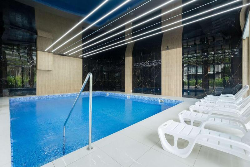 Pobierowo Baltic Residence Apartment with Pool & Balcony by Noclegi Renters - image 4