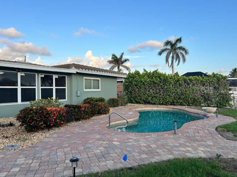 Coastal Getaway with Pool & Dock - image 1