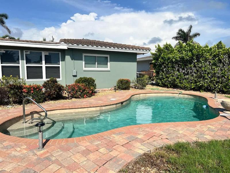 Coastal Getaway with Pool & Dock - image 7