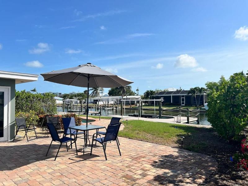 Coastal Getaway with Pool & Dock - image 12