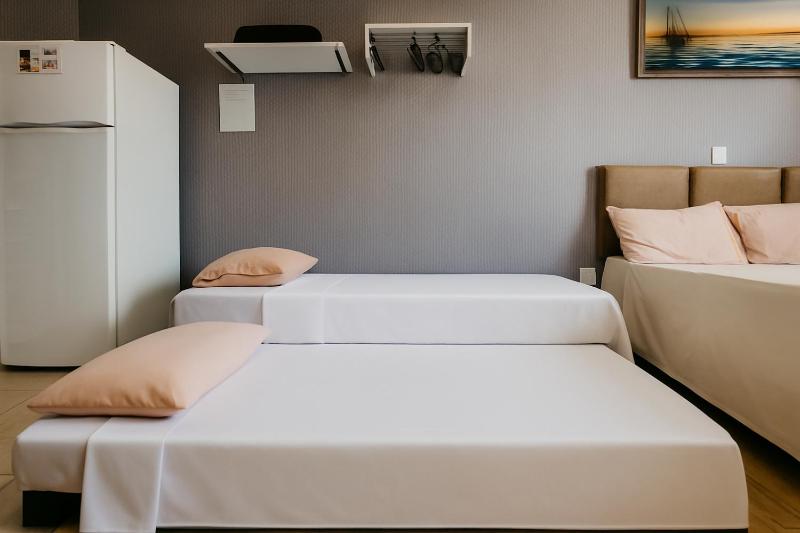 OLÍMPIA APARTS POUSADA apartamentos com cozinha e banheiro privativo PISCINA AQUECIDA - image 25