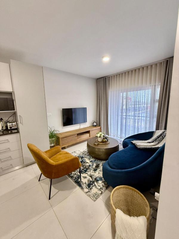 Urban Bleu - Modern 1 Bed Executive Apartment in Sarona Gaborone with WiFi Free Parking and Pool - image 11