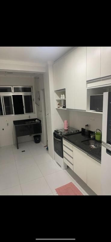 Apartamento com Suite Praia da Enseada Dois Quartos - image 9