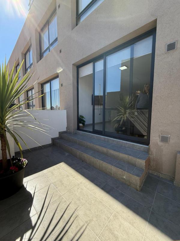 Departamento premium con amplio patio en pleno centro de Carlos Paz - image 12