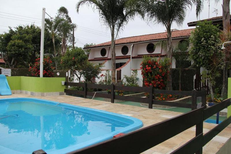 Sobrado em condomínio perto da praia localização privilegiada pet friendly - image 22