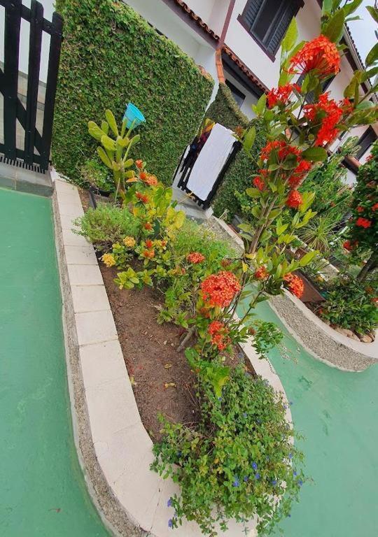 Sobrado em condomínio perto da praia localização privilegiada pet friendly - image 6
