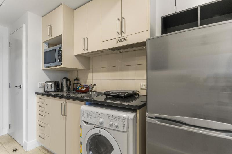 Skyline Sojourn Studio with Parking and Sea Views - image 9