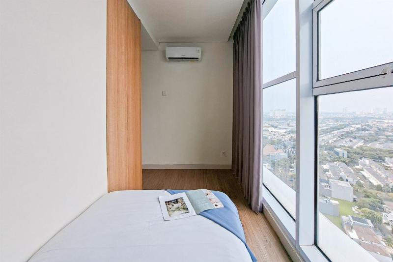 Well Designed 2BR at Brooklyn Alam Sutera Apartment By Travelio - image 9