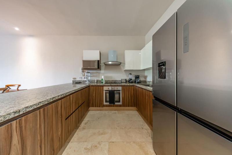 Spacious 2BR Condo with Pool and Private Balcony - image 13