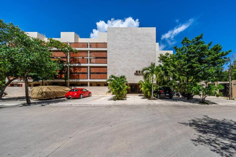 Spacious 2BR Condo with Pool and Private Balcony - image 7