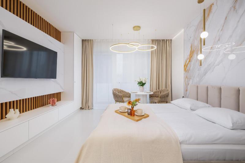 Eleganckie Apartamenty Zabrska z Parkingiem w Centrum Katowic Przy Rynku by Noclegi Renters - image 14