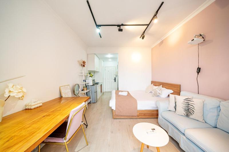 QingDai - Muted-Tone Urban Studio with City Outlook & Cozy Nook - image 2