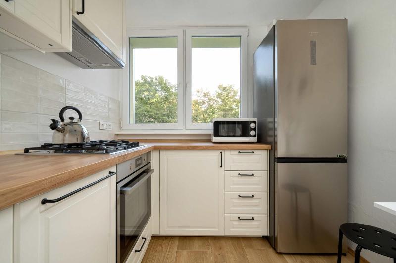 Blue Two Bedroom Apartment in Wrocław with Desk Bathtub and Balcony by Noclegi Renters - image 16