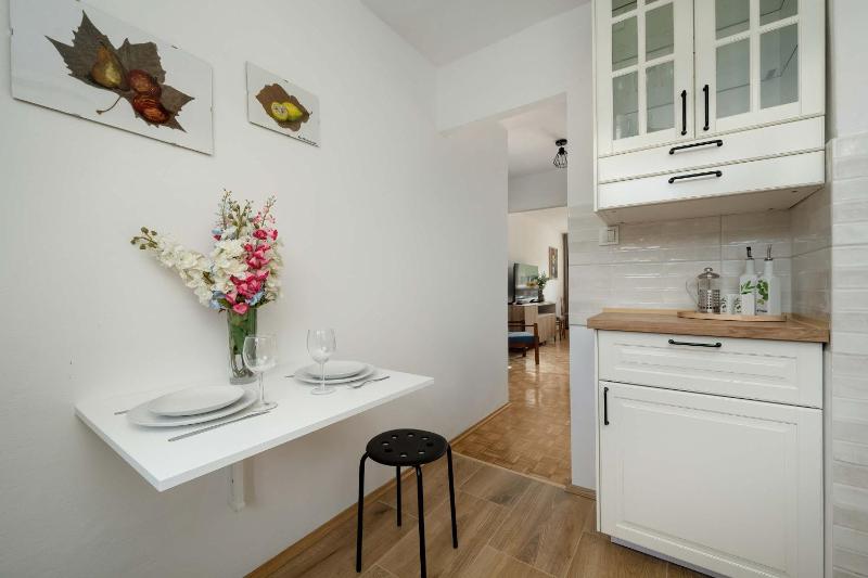 Blue Two Bedroom Apartment in Wrocław with Desk Bathtub and Balcony by Noclegi Renters - image 8