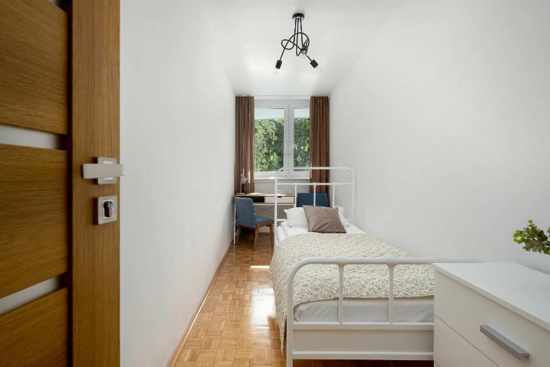 Blue Two Bedroom Apartment in Wrocław with Desk Bathtub and Balcony by Noclegi Renters - image 6