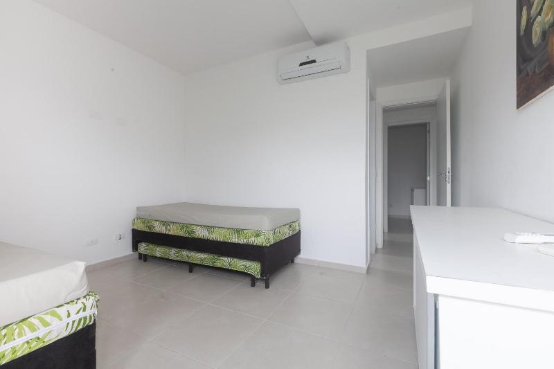 Apartamento Ubatuba AR Varanda Gourmet Piscinas e 300mt Praia - image 20