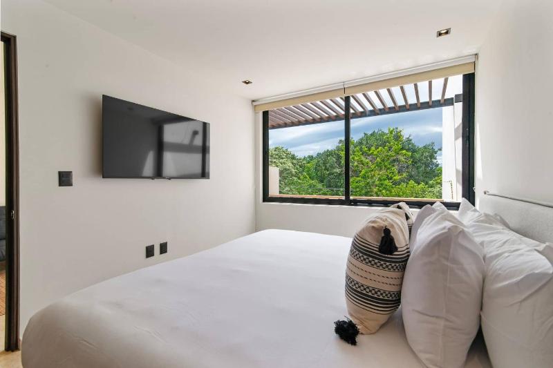 Stylish 1BR Condo with Private Pool & Balcony - image 35