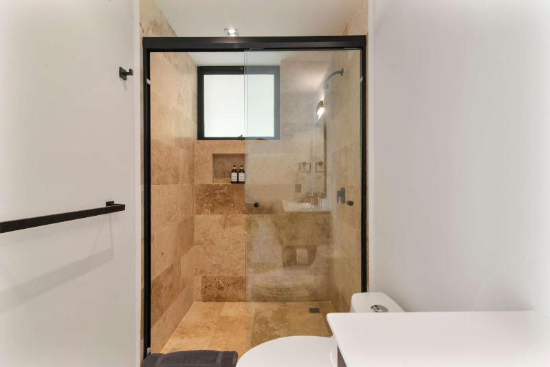 Stylish 1BR Condo with Private Pool & Balcony - image 22