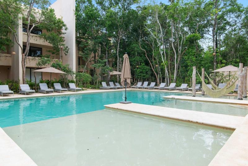Stylish 1BR Condo with Private Pool & Balcony - image 31