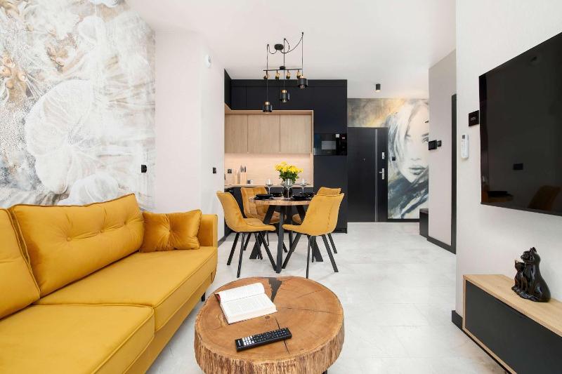 Black and Yellow Apartment in Rzeszów Close to the River with Air Conditioned Living Room by Noclegi Renters - image 19