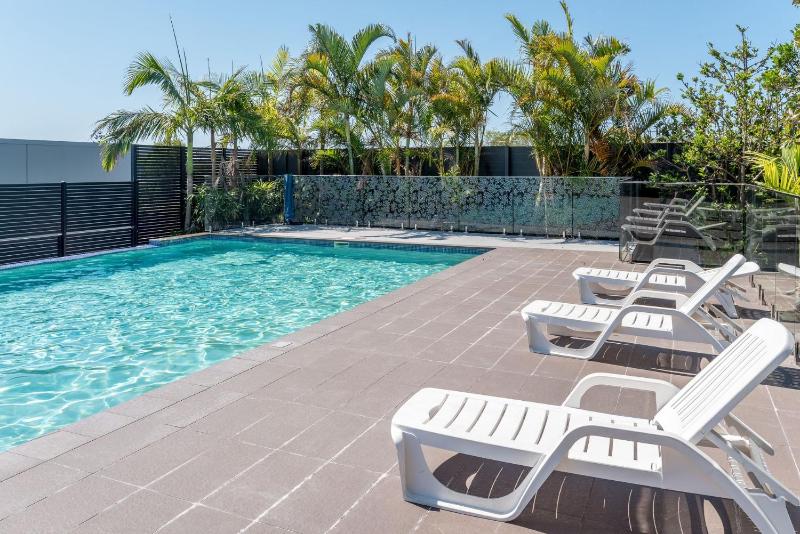 East Village Poolside Apartment - 15 Min to Brisbane Airport - image 2