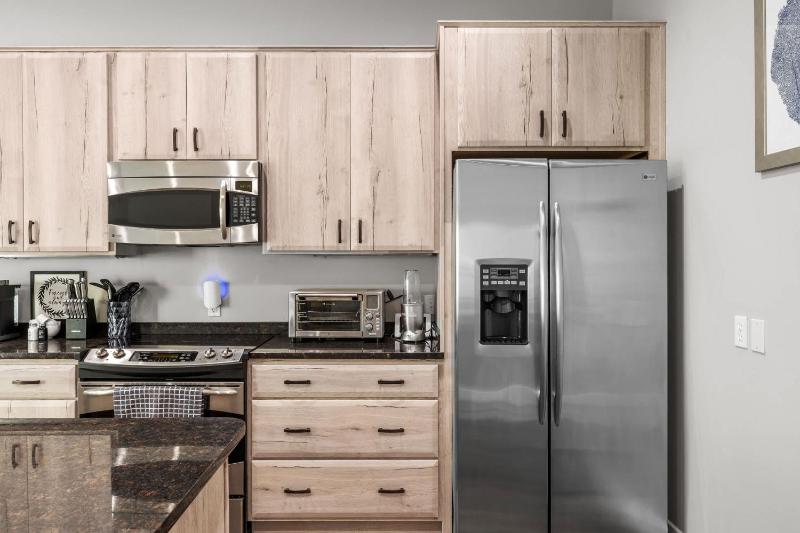 NEW Elegant Downtown Escape with Modern Comforts - image 40