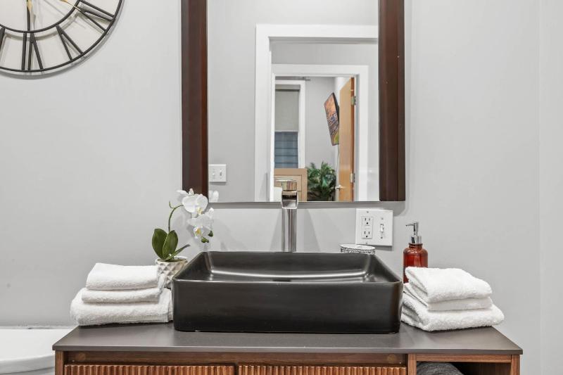 NEW Elegant Downtown Escape with Modern Comforts - image 48