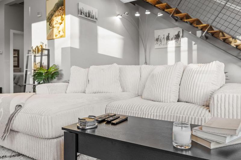NEW Elegant Downtown Escape with Modern Comforts - image 11