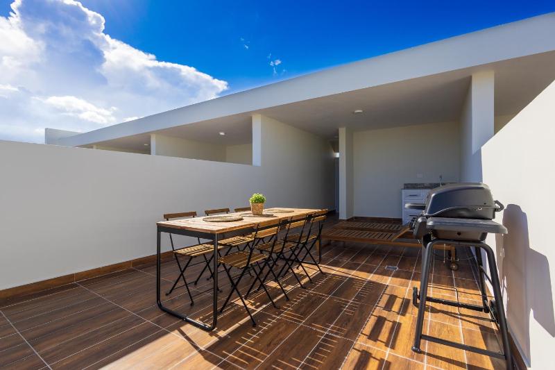 2BR Tropical Escape - Private Terrace BBQ Pool Walk to Beach - image 15