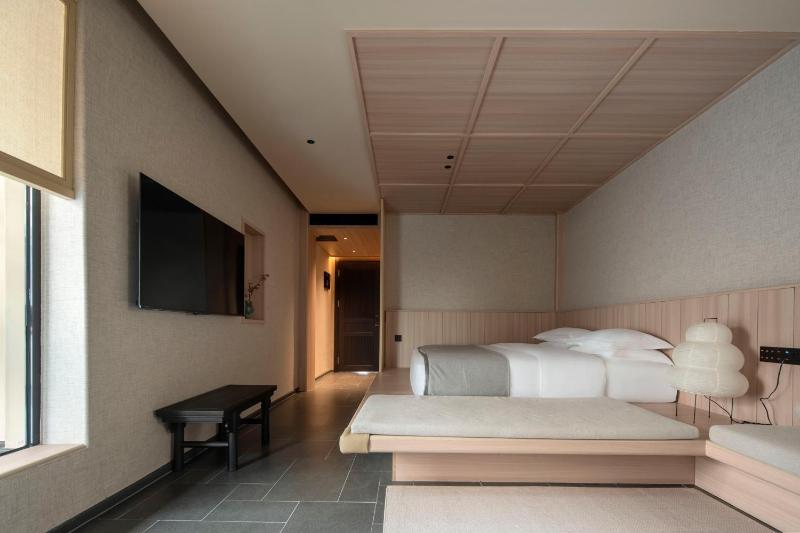Pushe Renmei Hotel 蒲舍酒店 - image 26