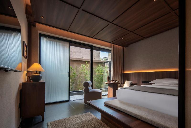 Pushe Renmei Hotel 蒲舍酒店 - image 22