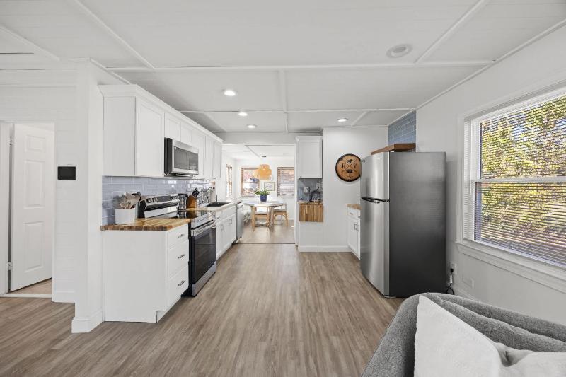 Cozy 2BR Home Near Downtown w Backyard & Parking - image 42
