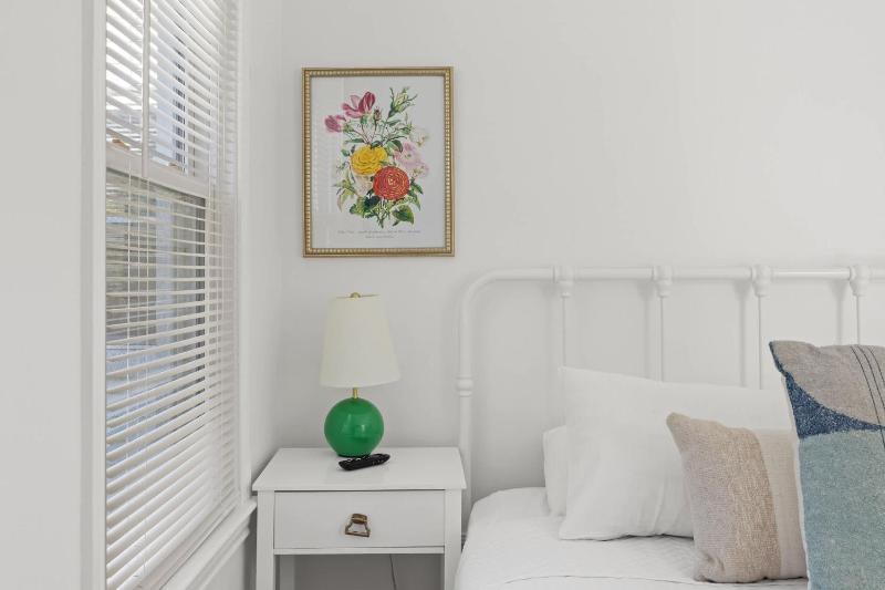 Cozy 2BR Home Near Downtown w Backyard & Parking - image 33