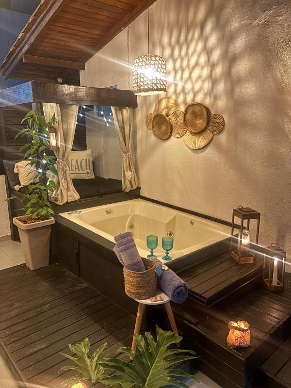 Chalé com lareira & jacuzzi privativa aquecida 300 m da Praia e Roda Gigante - image 36